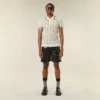 Polo-T-Shirt aus offenmaschigem Strick